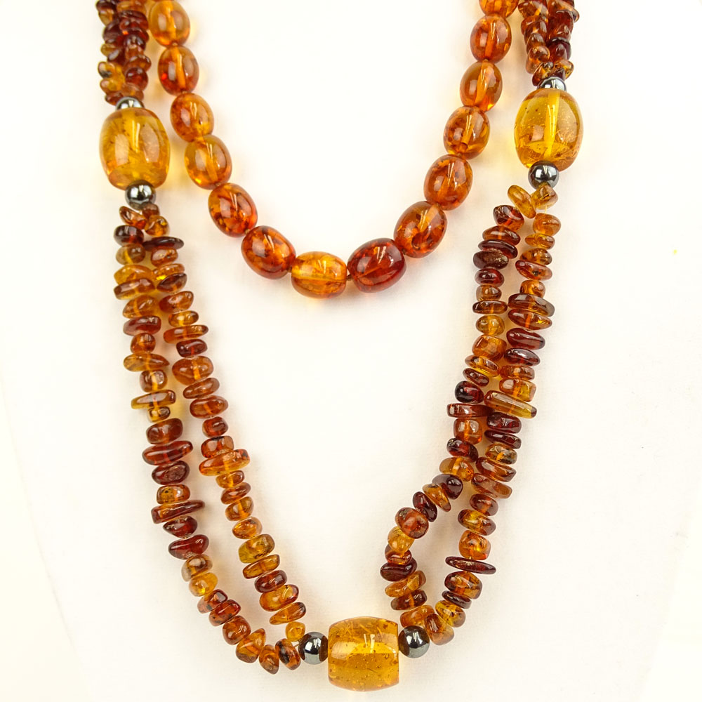 Two Vintage Chinese Amber Beaded Necklace. | Kodner Auctions