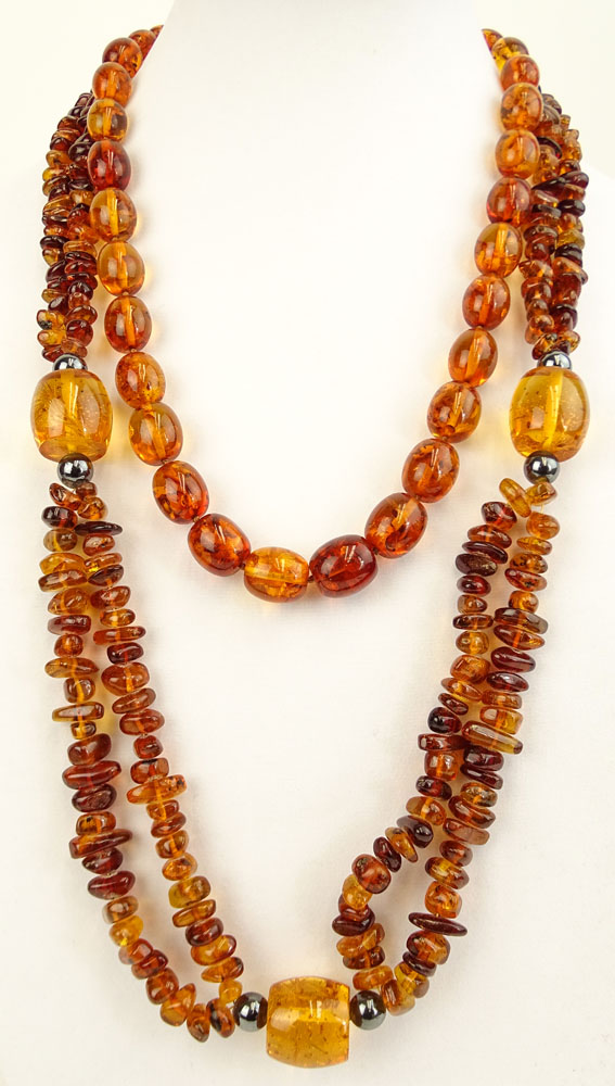 Two Vintage Chinese Amber Beaded Necklace.