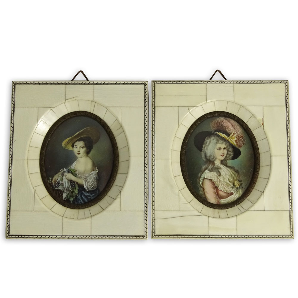 Pair of antique German hand painted Ivory miniature portraits of Ladies. In ivory inlaid frames.