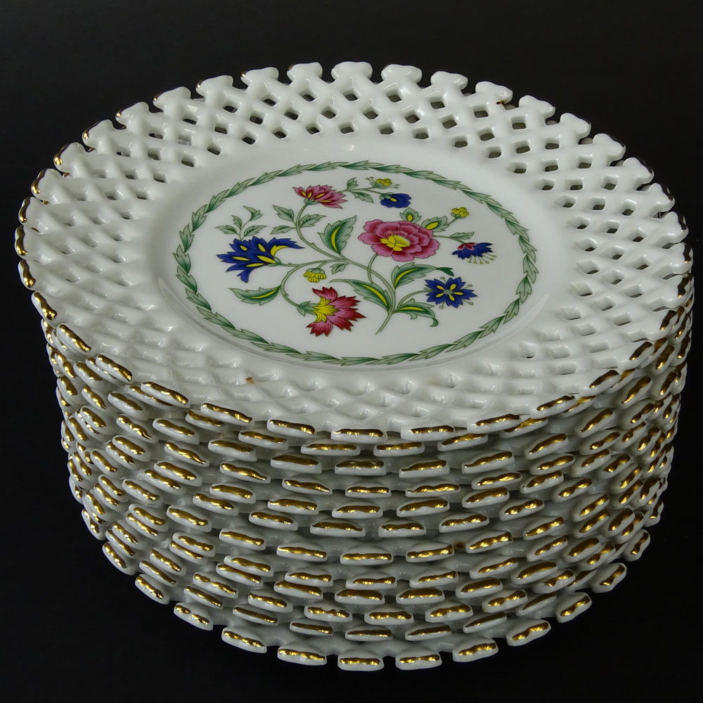 Set of 12 Reticulated Porcelain Dessert Plates.