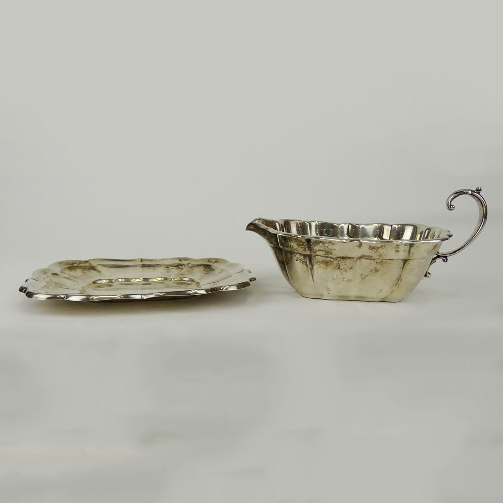 Vintage Reed & Barton Sterling Silver gravy/sauce boat and liner in the Windsor pattern.