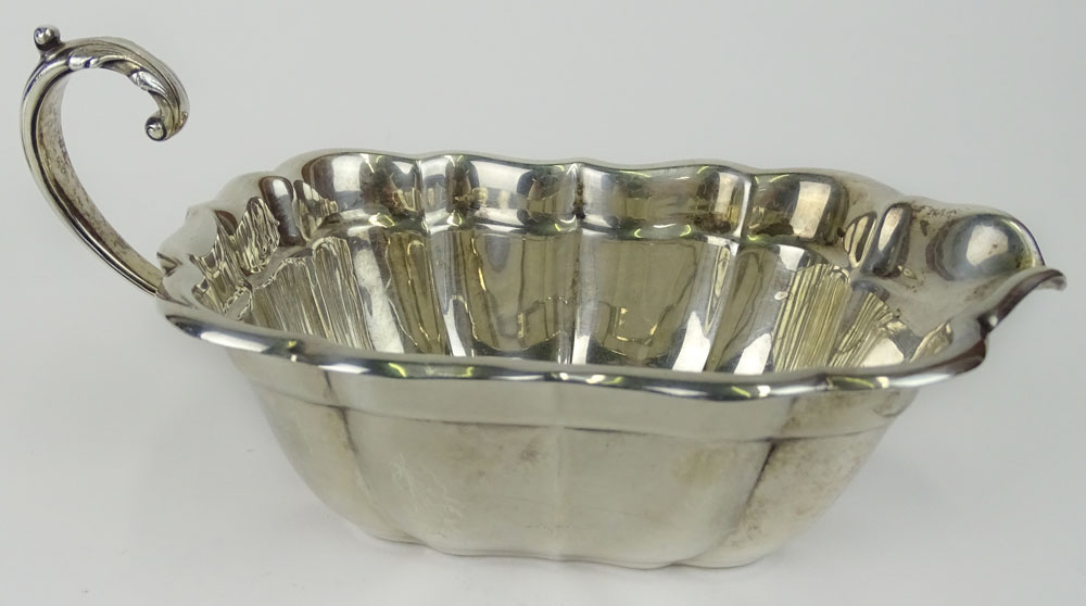 Vintage Reed & Barton Sterling Silver gravy/sauce boat and liner in the Windsor pattern.