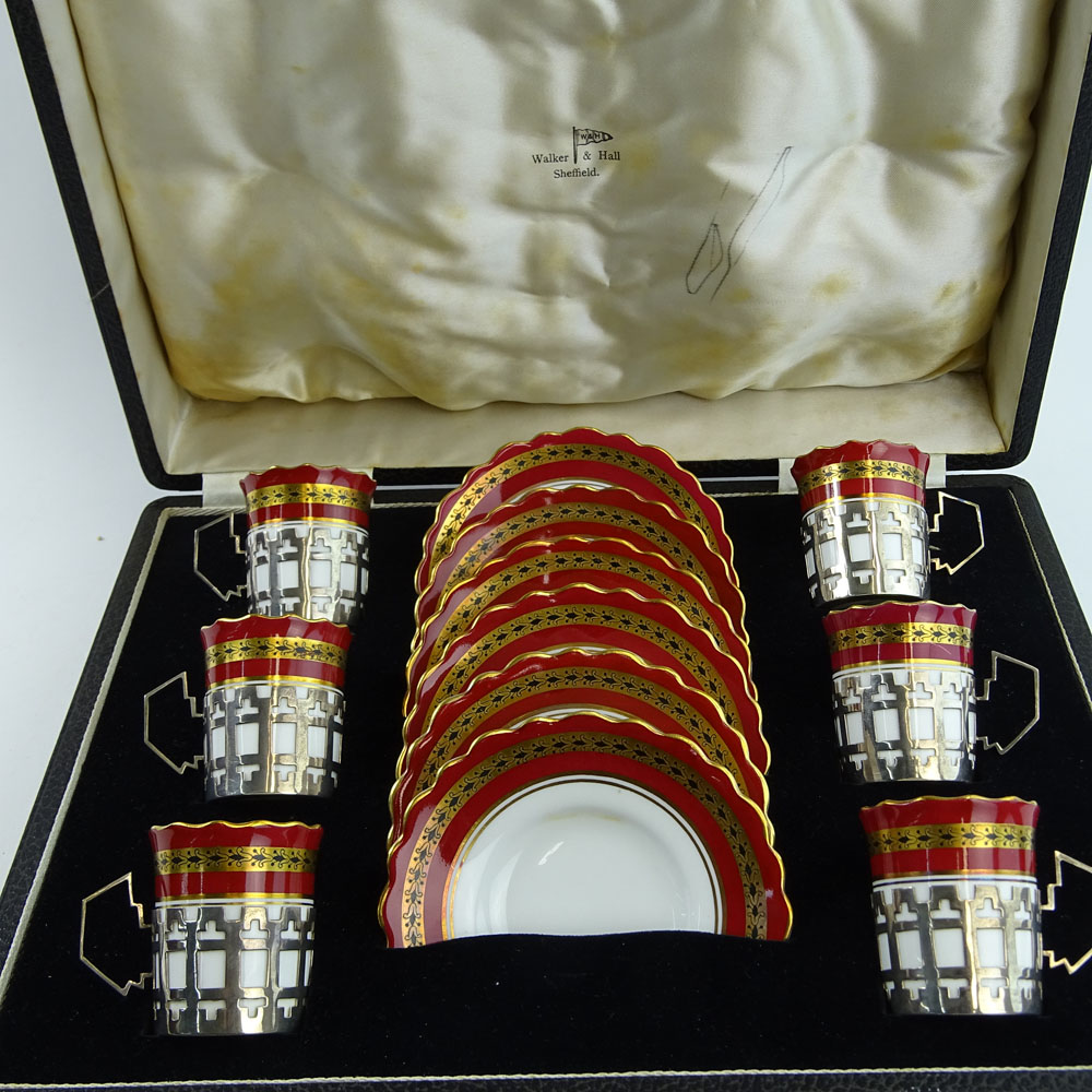 Set of 12 Mid 20th Century Aynsley Porcelain Demitasse Cups in Sterling Silver Holders and Saucers In Original Fitted Shagreen Covered Case.