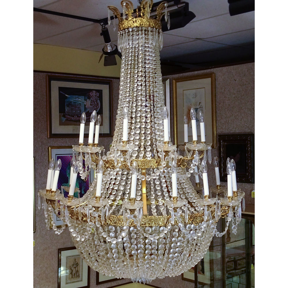 Contemporary Grand Scale Louis XVI style Bronze and Crystal Chandelier.