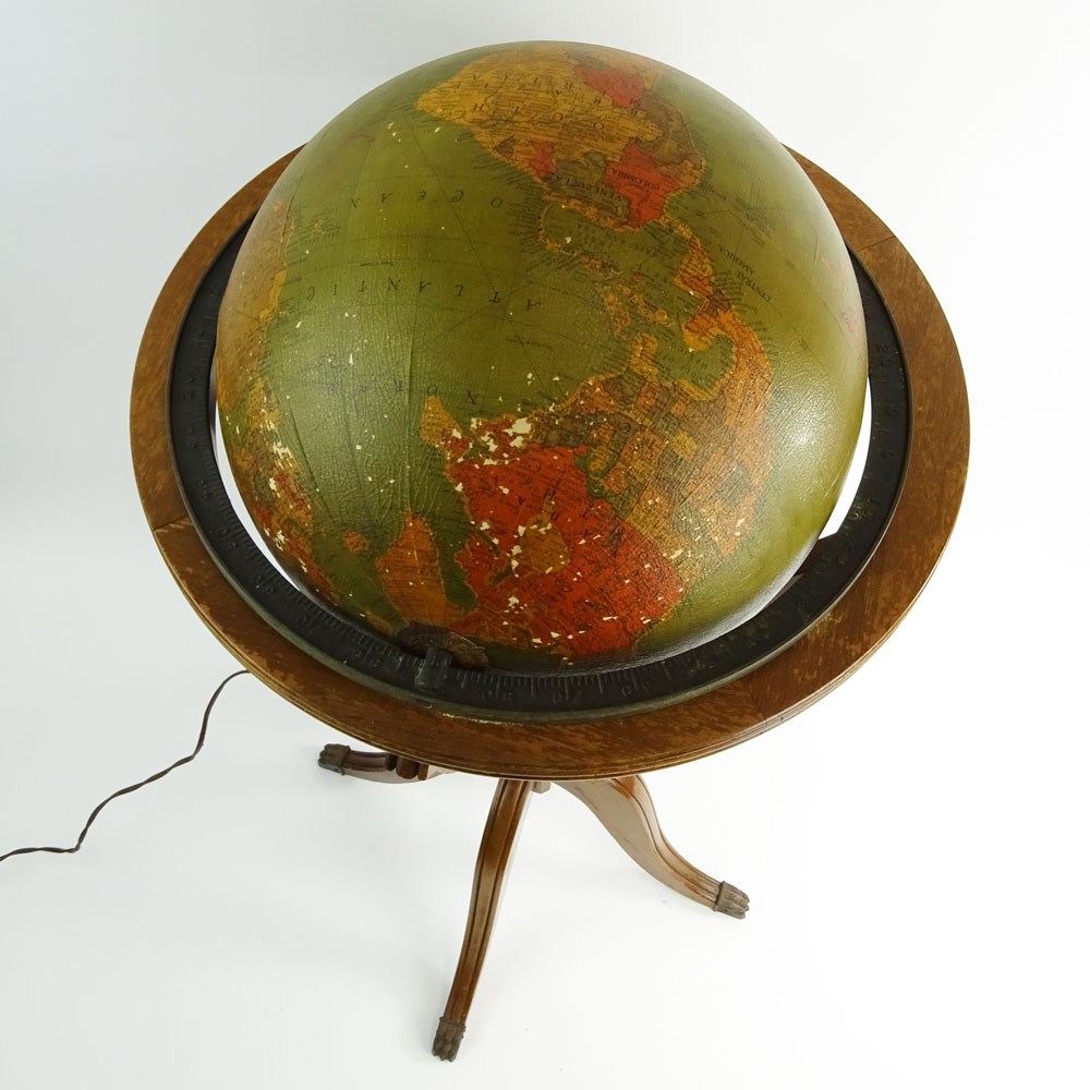 Vintage Lighted Glass World Globe on Wood Stand.