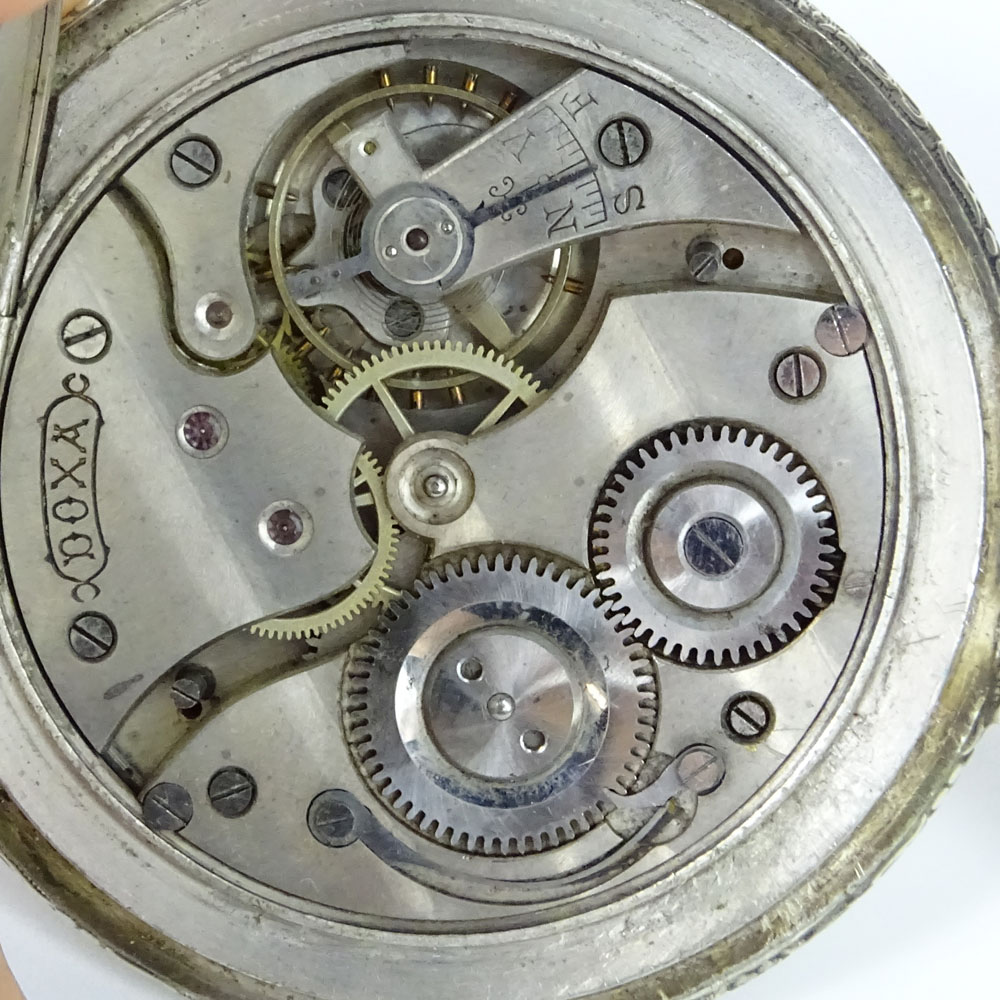 Antique Doxa Erotic Oversize Pocket watch. Chased train design on back of case.