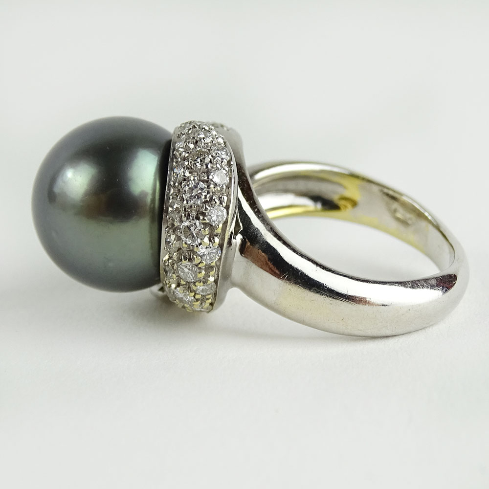 Vintage 12.5mm Tahitain Black Pearl, 1.0 Carat Pave Set Round Cut Diamond and 14 Karat White Gold Ring. 