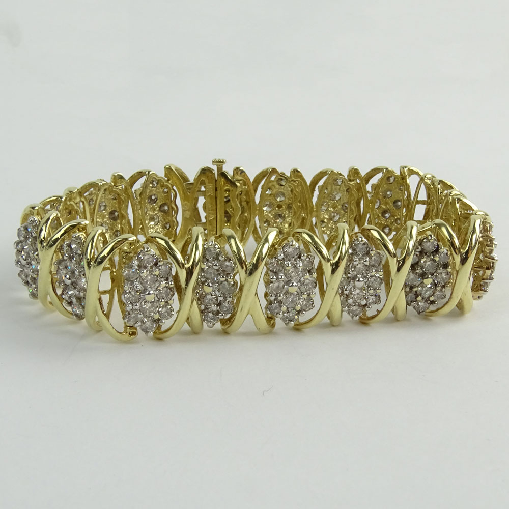 Lady's Vintage 10 Karat Yellow Gold and Diamond Cluster Bracelet.
