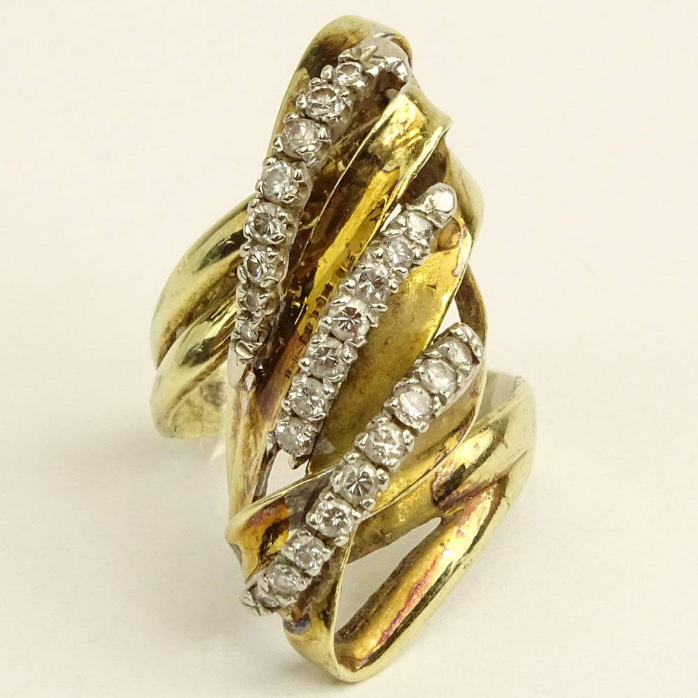 Lady's Vintage 14 Karat Yellow Gold Ring accented with small round cut diamonds.