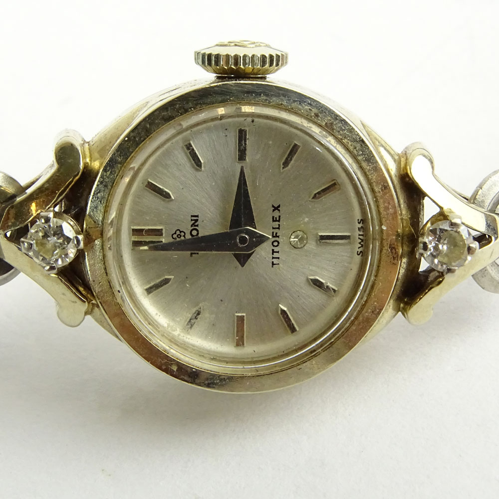 18 Karat White Gold and Diamond Tittoni Manual Movement Watch with Gold Filled Bracelet.