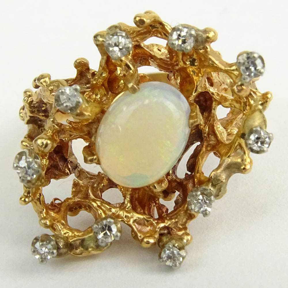 Vintage White Opal and 14 Karat Yellow Gold Ring with small diamond accents.