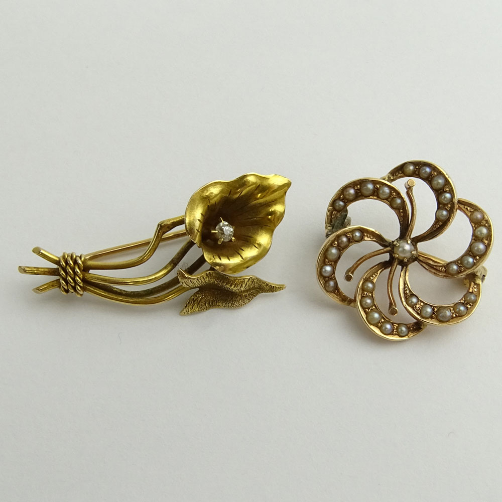 Two (2) Small 10 Karat Yellow Gold Flower Brooches.