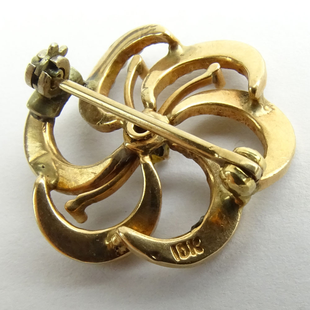 Two (2) Small 10 Karat Yellow Gold Flower Brooches.