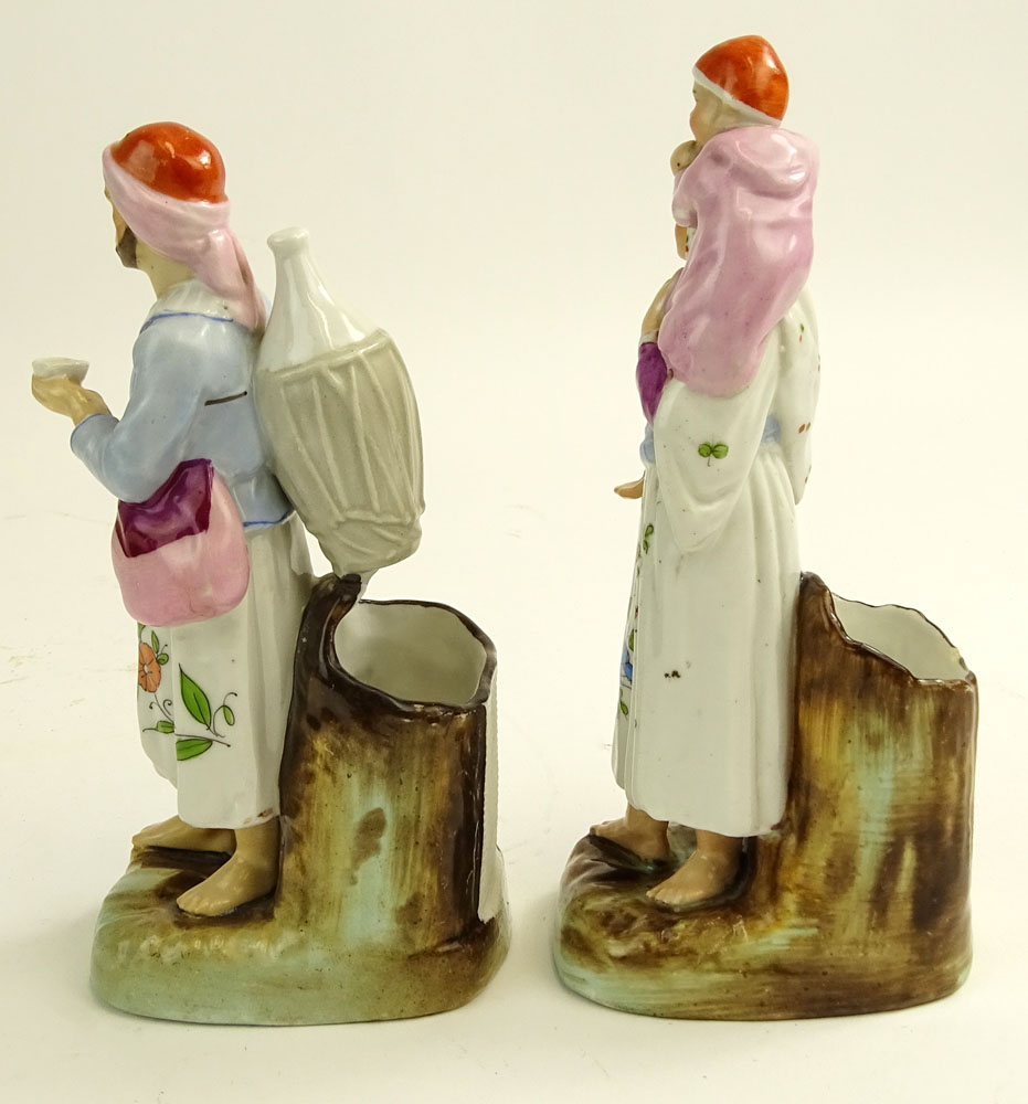 Pair of Vintage Turkish Hand Painted Porcelain Figural Vases. Man and woman with child.