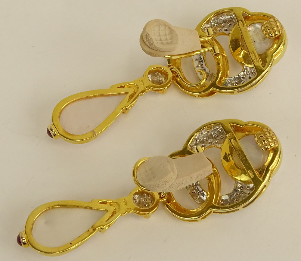Pair of Mabe Pearl, Approx. 3.20 Carat Micro Pave Set Diamond and 14 Karat Yellow Gold Pendant Earclips.