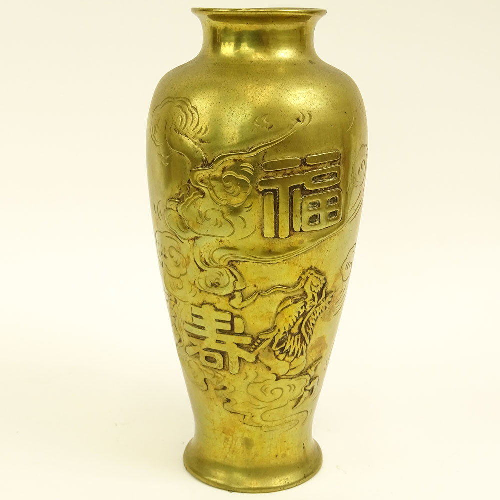 Antique Chinese Brass Urn. Decorated with character marks, clouds, dragon otherwise unsigned. 