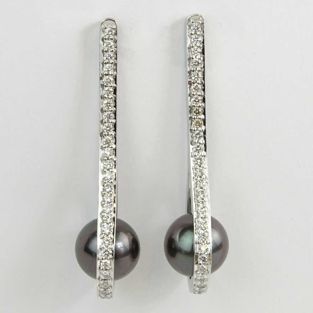 Pair of Lady's Silver Black Tahitian Pearl and 14 Karat White Gold Earrings