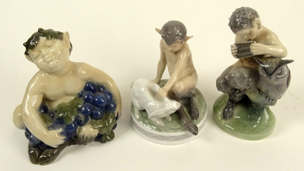 Lot of Three (3) Royal Copenhagen Porcelain Satyr Figurines in Various Poses with bunny and flute.