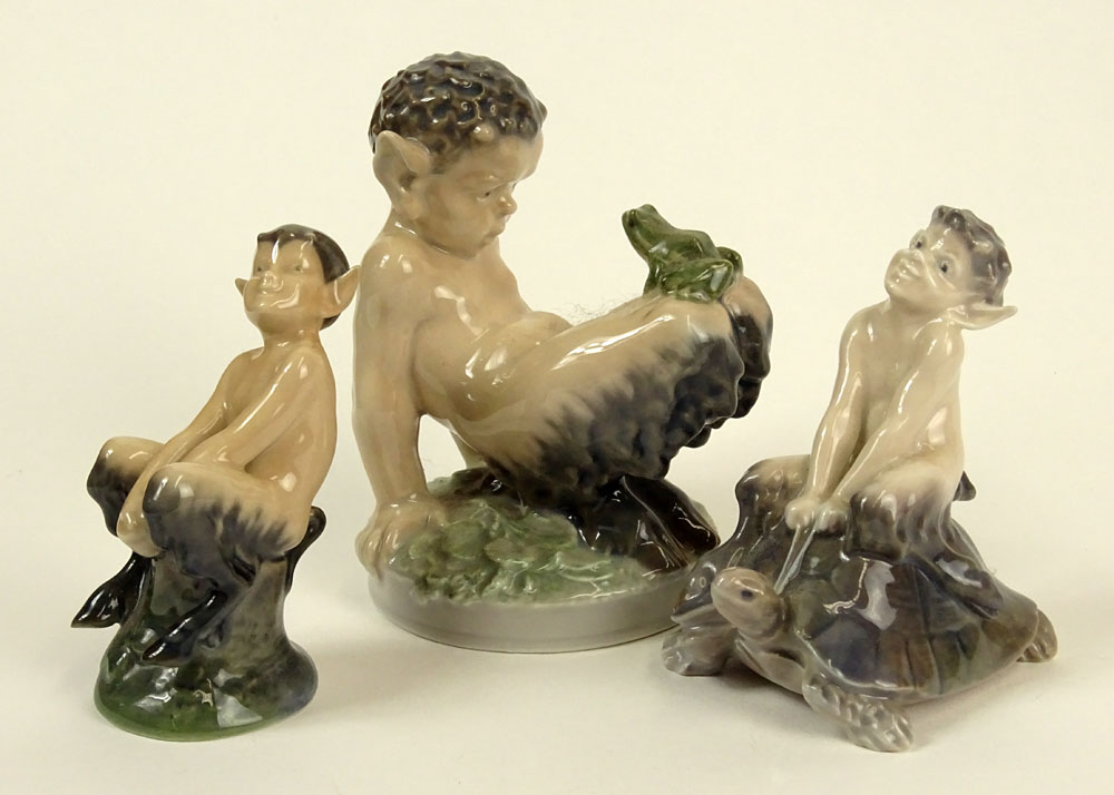 Lot of Three (3) Royal Copenhagen Porcelain Satyr Figurines in Various Poses with frogs and turtles.