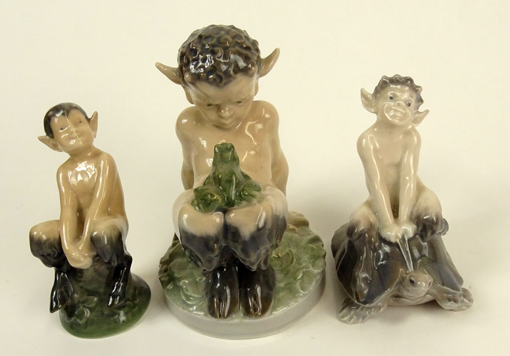 Lot of Three (3) Royal Copenhagen Porcelain Satyr Figurines in Various Poses with frogs and turtles.