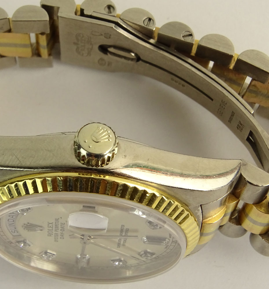 Men's Rolex 18 Karat Gold Tridor Oyster Perpetual Day Date President Chronometer watch.