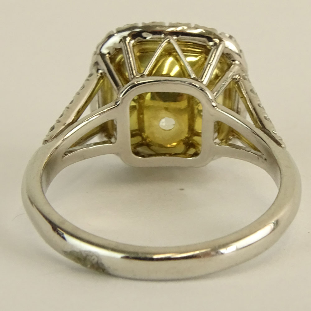 5.03 Carat Radiant Cut Fancy Intense Yellow Diamond, Platinum and 18 Karat Yellow Gold Engagement Ring 