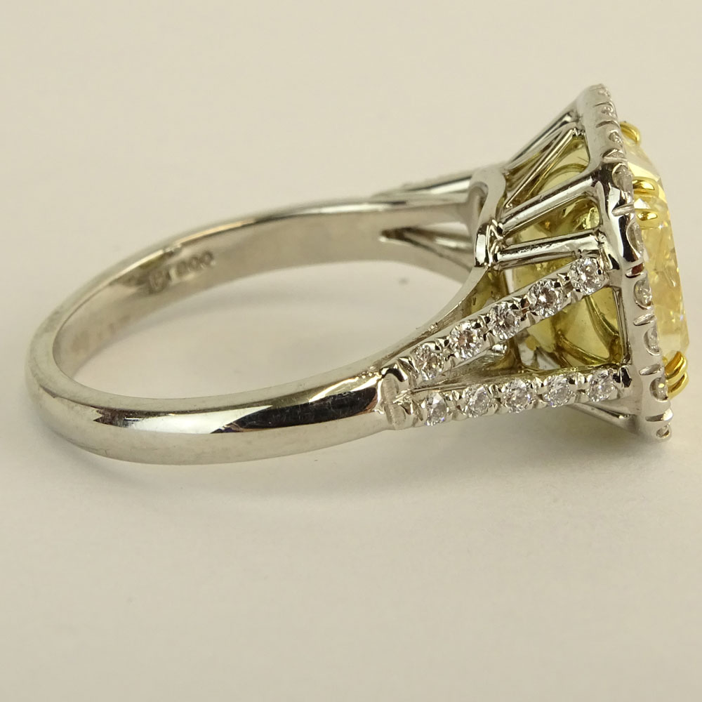 5.03 Carat Radiant Cut Fancy Intense Yellow Diamond, Platinum and 18 Karat Yellow Gold Engagement Ring 