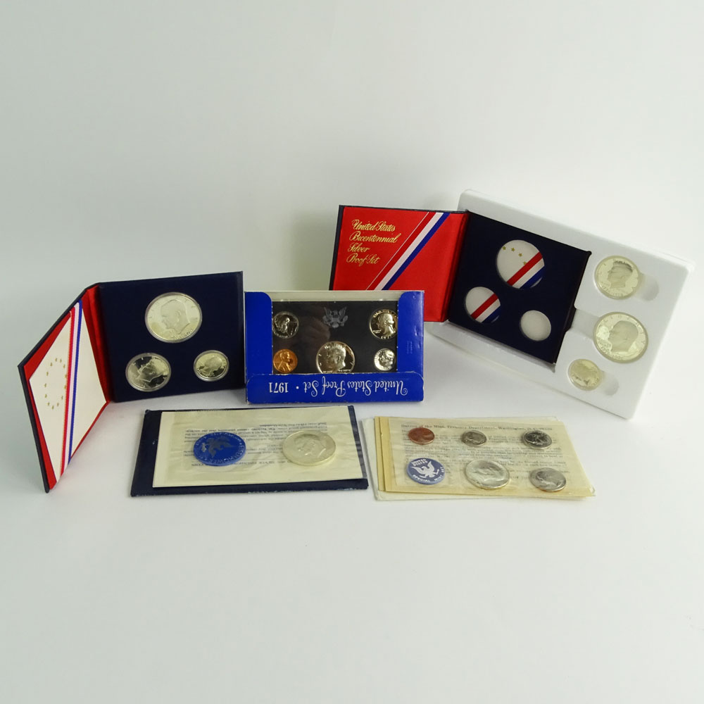 Collection US Proof Coin Sets and Uncirculated Eisenhower Dollar Coins.