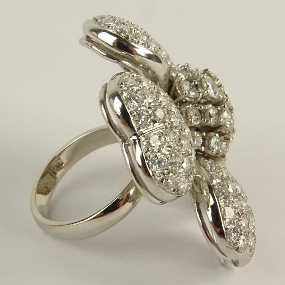 Lady's Approx. 12.0 Carat Round Brilliant Cut Diamond and 18 Karat White Gold Flower Ring.