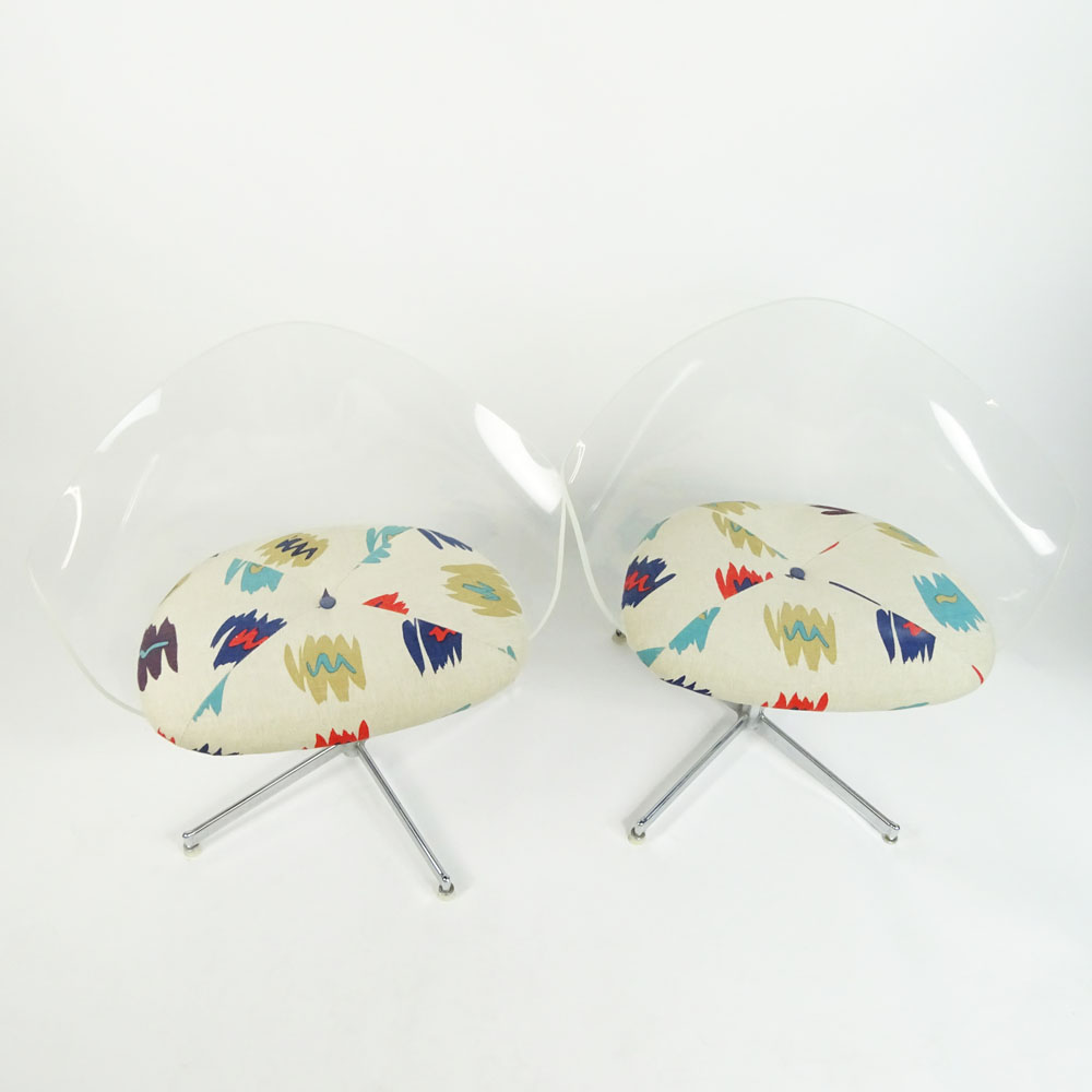 Pair of Mid Century Modern Lucite and Chrome Swivel Chairs.