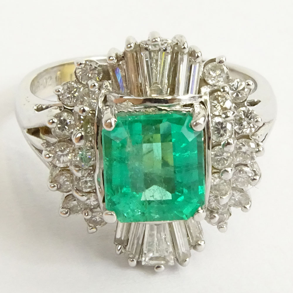 AIG Certified 1.59 Carat Emerald Cut Emerald, .93 Carat Diamond and 14 Karat White Gold Ring.