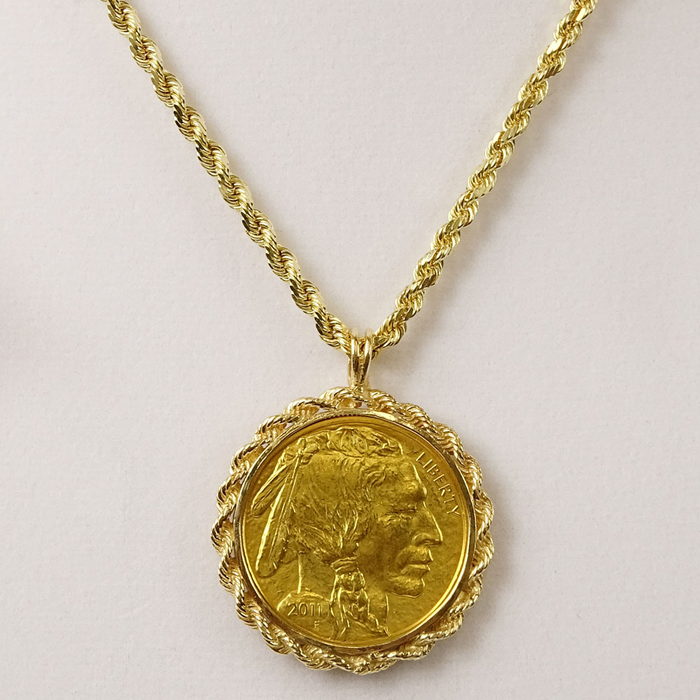 24 Karat Yellow Gold Buffalo Gold Coin Pendant in Gold Bezel and with 14 Karat Yellow Gold Rope Chain.