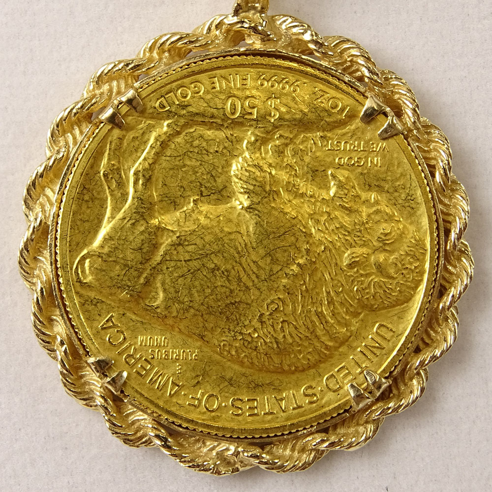 24 Karat Yellow Gold Buffalo Gold Coin Pendant in Gold Bezel and with 14 Karat Yellow Gold Rope Chain.