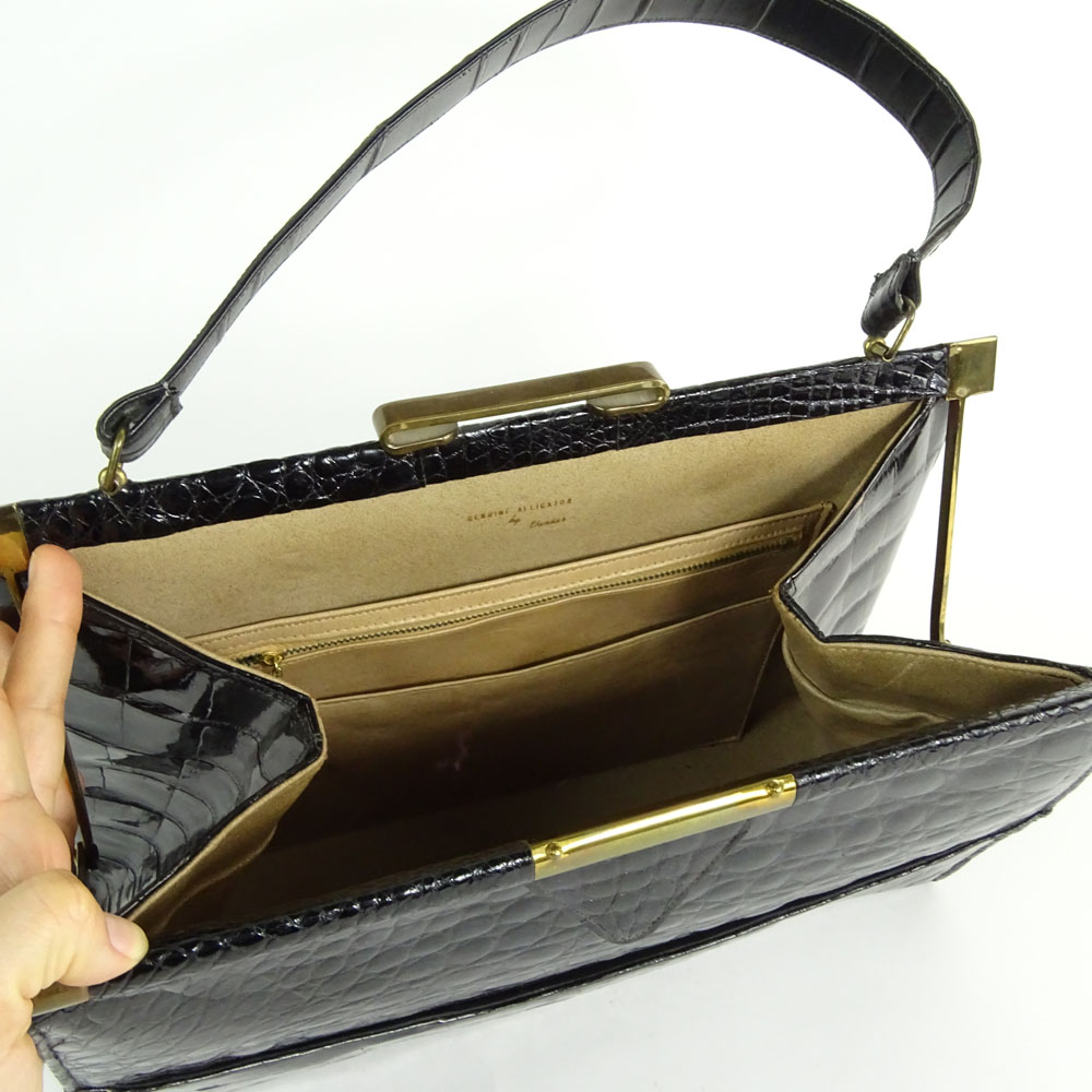 Vintage Alligator Handbag. Rich black color. Leather interior.