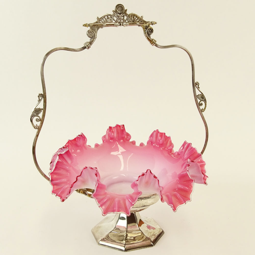 Victorian Cased Glass Ruffled Brides Basket on Silver Plate Frame.