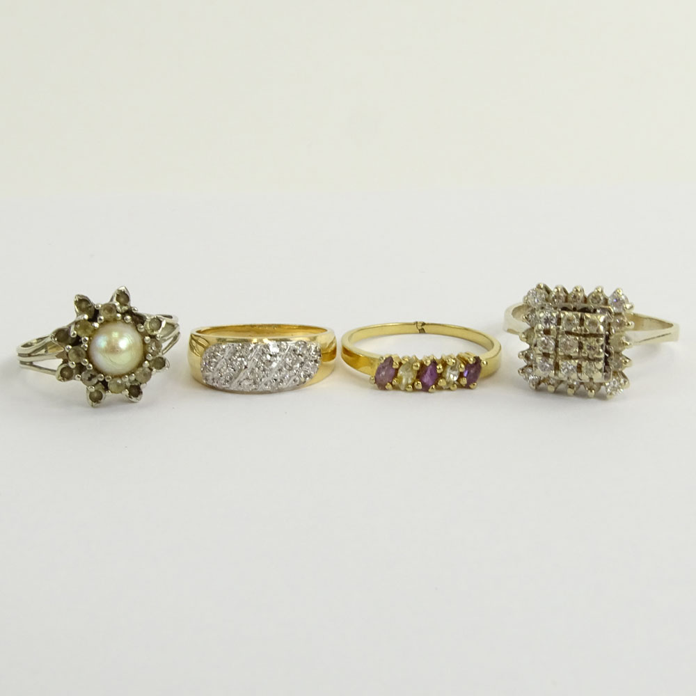 Collection of Four (4) Diamond and Gemstone Rings.