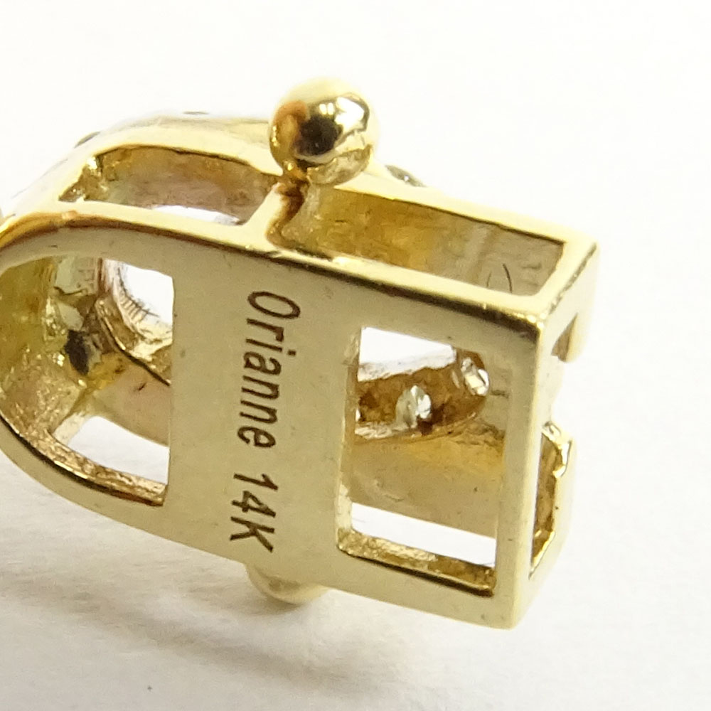 AIG Certified 7.45 Carat Oval Cut Ruby, 5.18 Carat Round Brilliant Cut Diamond and 14 Karat Yellow Gold Bracelet. 