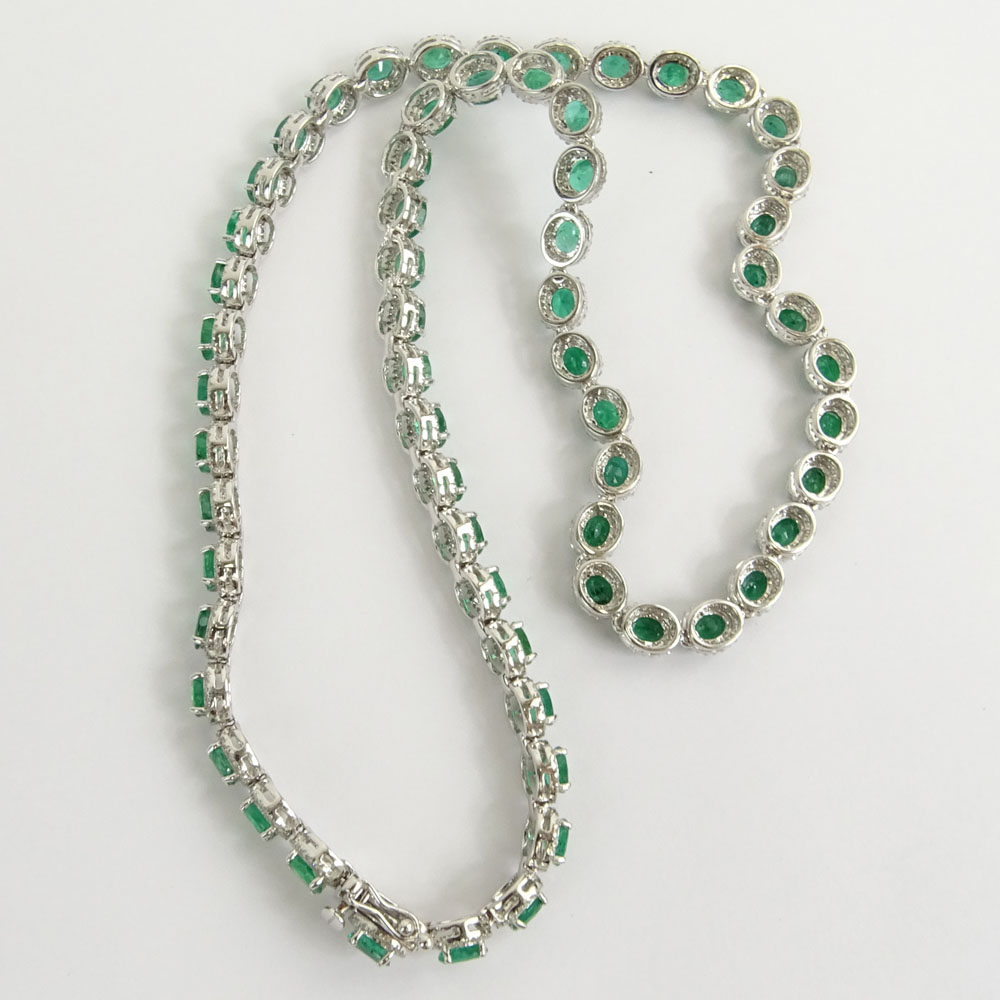 AIG Certified 20.63 Carat Oval Cut Emerald, 3.95 Carat Round Brilliant Cut Diamond and 14 Karat White Gold Necklace. 