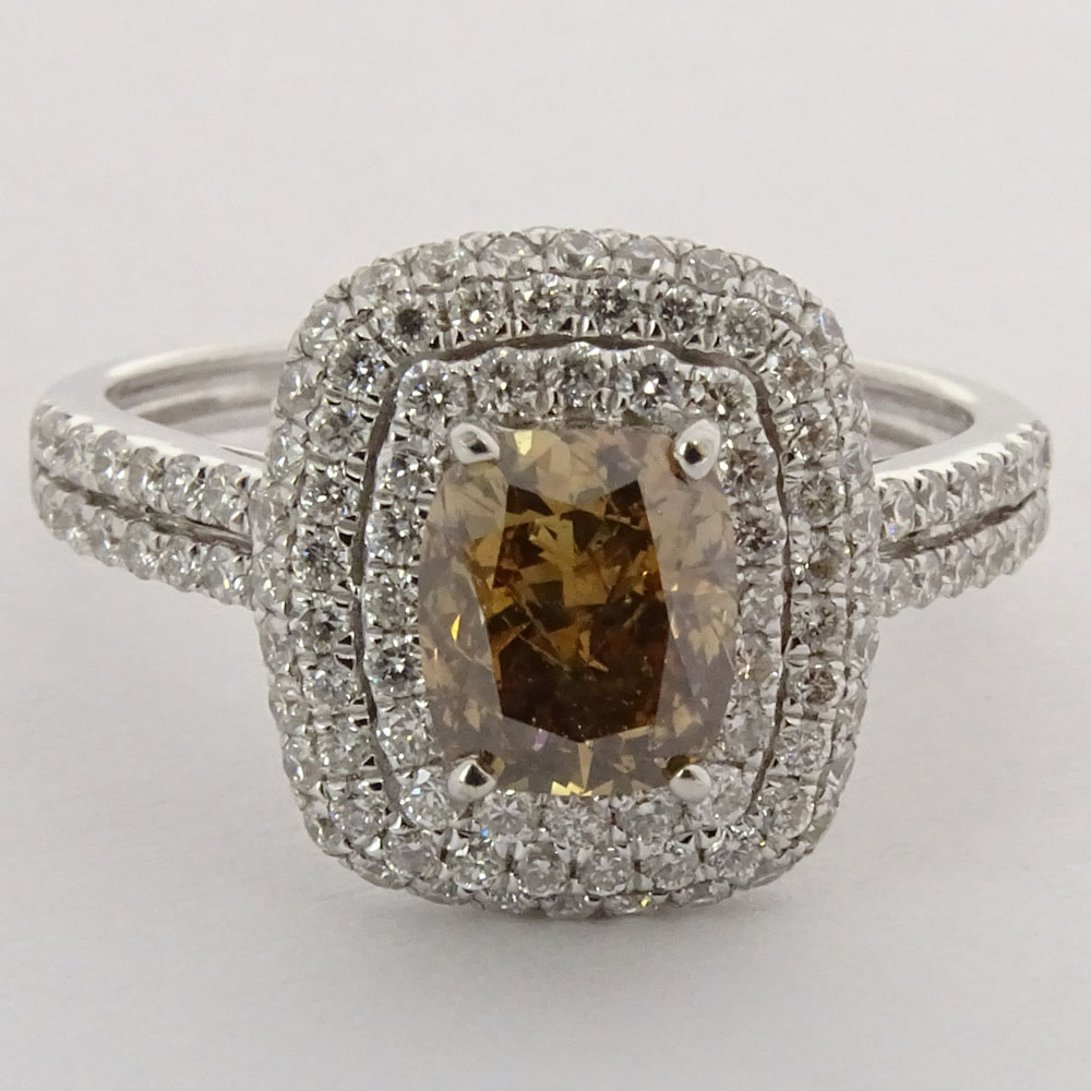 AIG Certified 1.18 Carat Cushion Cut Fancy Brown Diamond and 18 Karat White Gold Ring Accented with .93 Carat Round Brilliant Cut Diamonds.