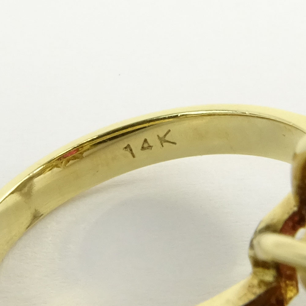 GLA Certified 3.57 Carat Oval Cut Ruby, 1.03 Carat Round Cut Diamond and 14 Karat Yellow Gold Ring. 