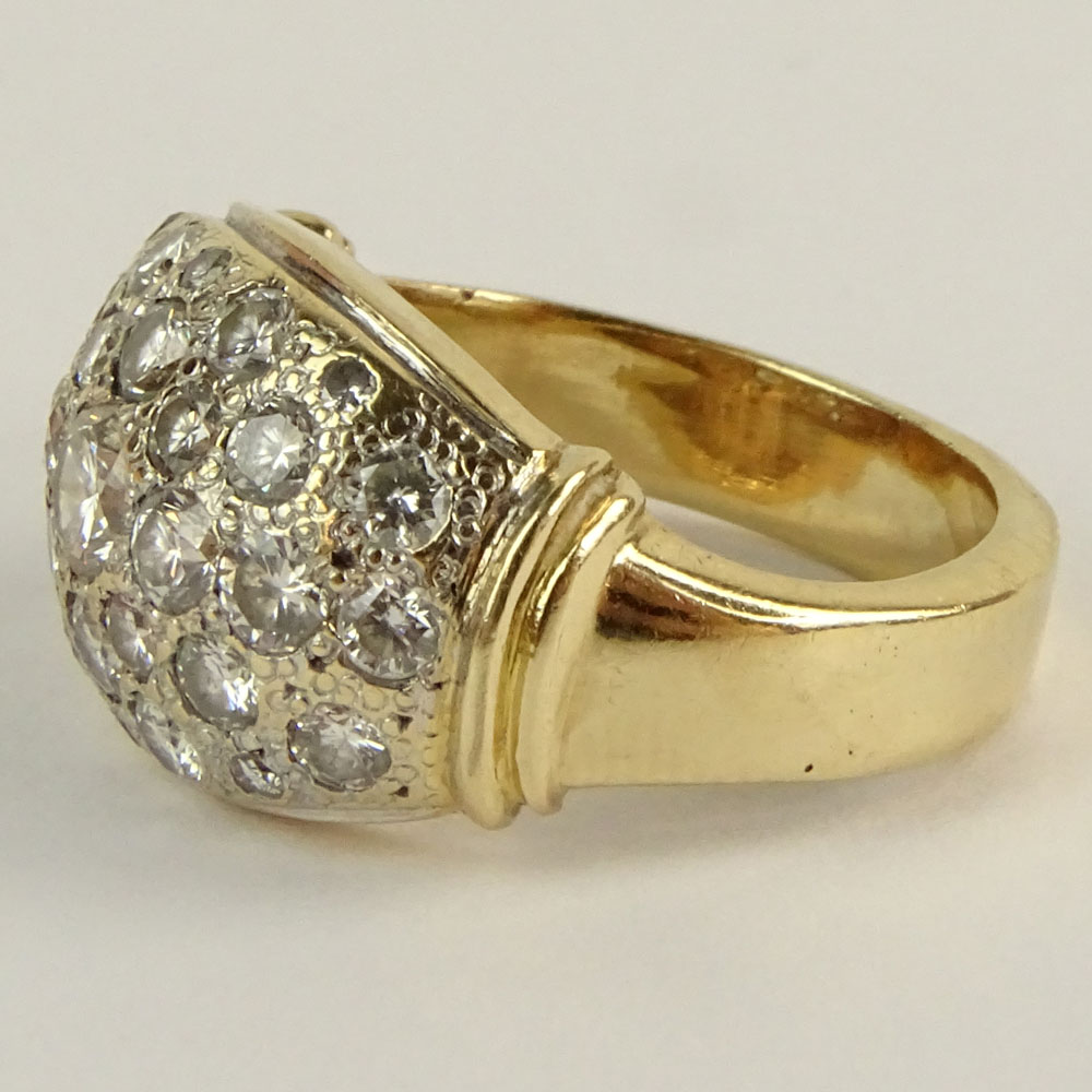 Lady's Pave Set Round Brilliant Cut Diamond and 14 Karat yellow Gold Ring.