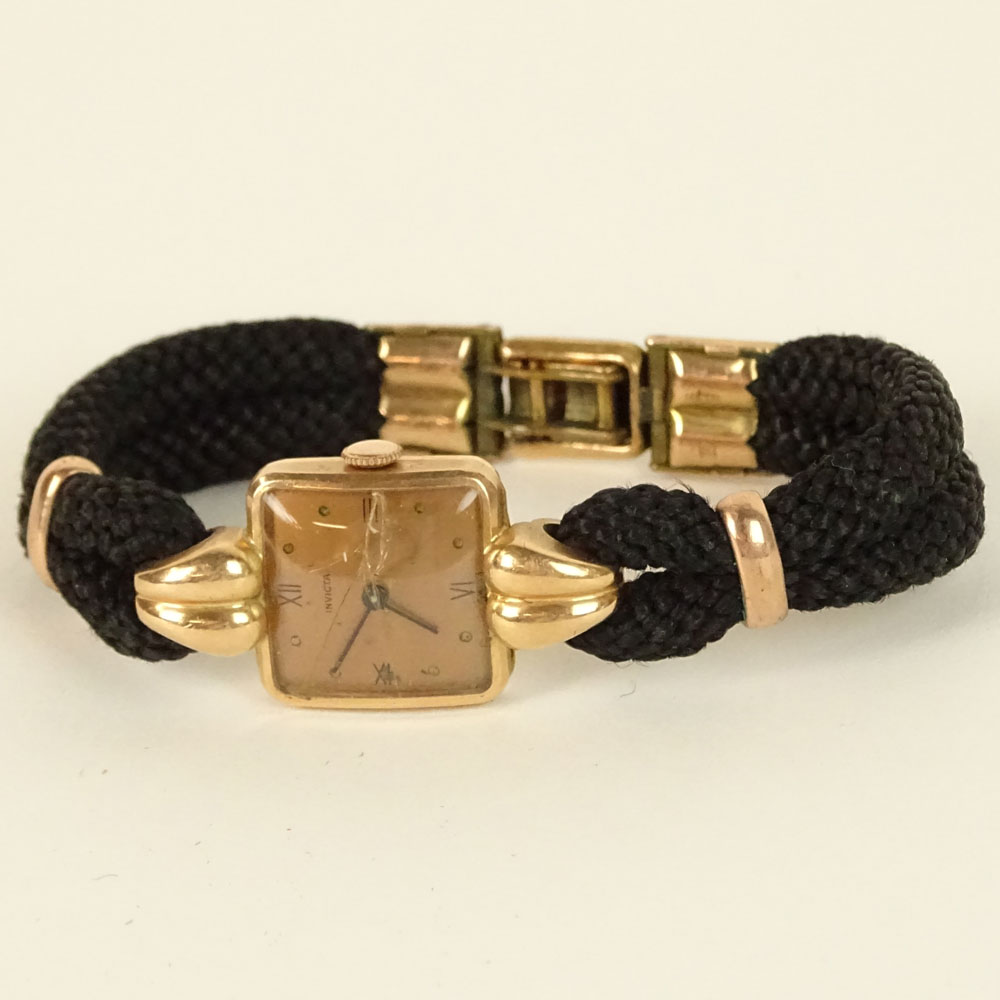 Ladies Vintage 14K Rose Gold Watch On Braided Band. Signed Invicta and other various marks.