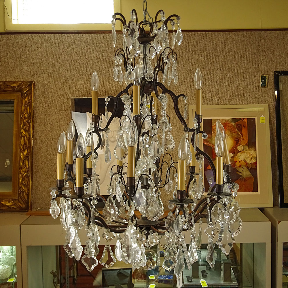 Louis XV Style Wrought Iron and Crystal 12 Arm Cage Chandelier. 16 Lights total.