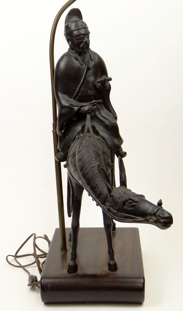 Early 20th Century Chinese Bronze "Scholar Riding a Donkey" Bearded Figure Wearing a Simple long Robe Holding a Scroll.