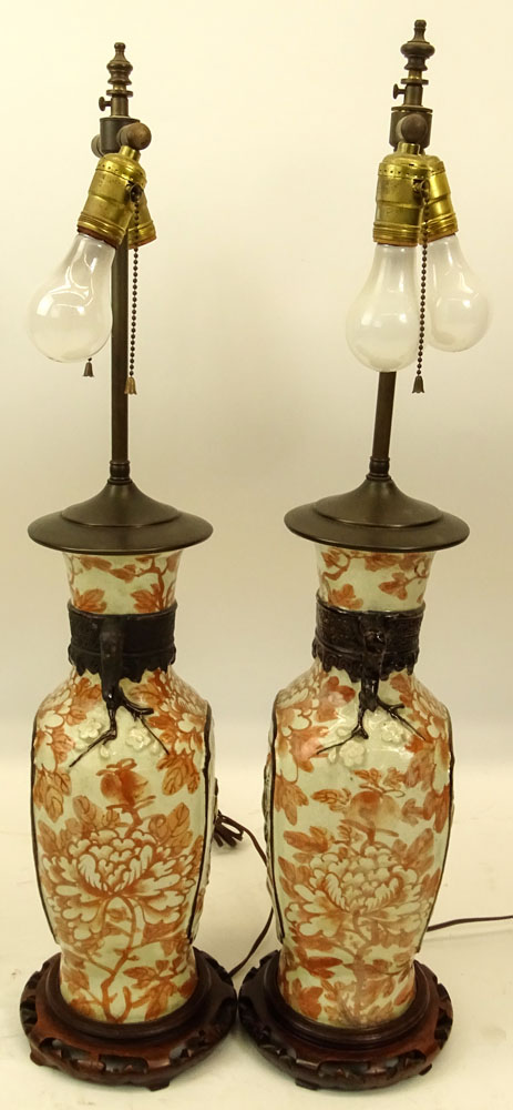 Pair of Chinese Pottery Urn Lamps on Hardwood Bases.