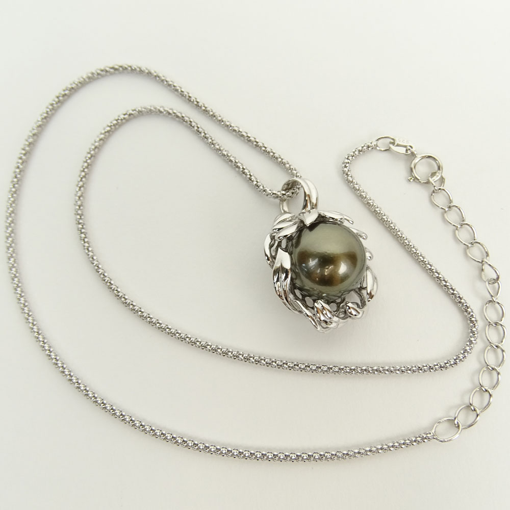 Lady's Black Pearl and Sterling Silver Pendant Necklace. Pearl measures 13.5mm.