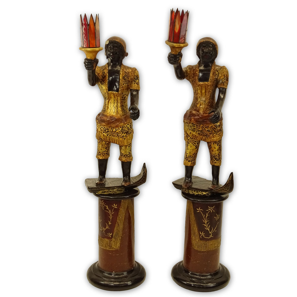 Pair of Early to Mid 20th Century Venetian style Carved Painted and Parcel Gilt Blackamoor Gondolier Figures on Bases.