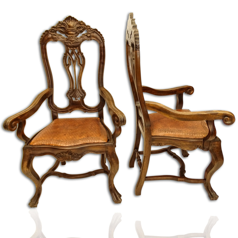 Pair of 20th Century Brazilian Portuguese Style Carved Wood and Tooled Leather Arm Chairs.