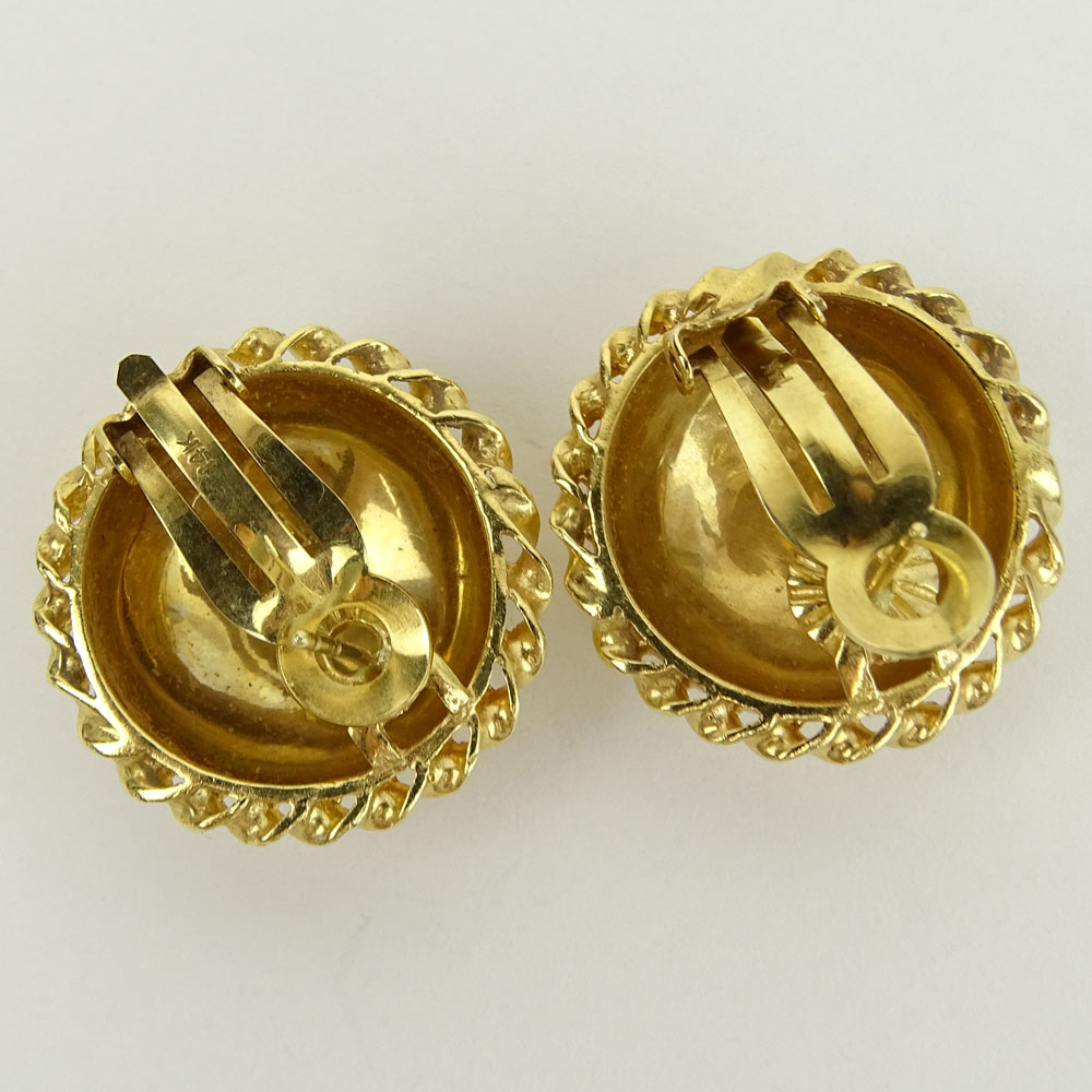 Vintage 14 Karat Yellow Gold Button style earrings. Signed 14K.