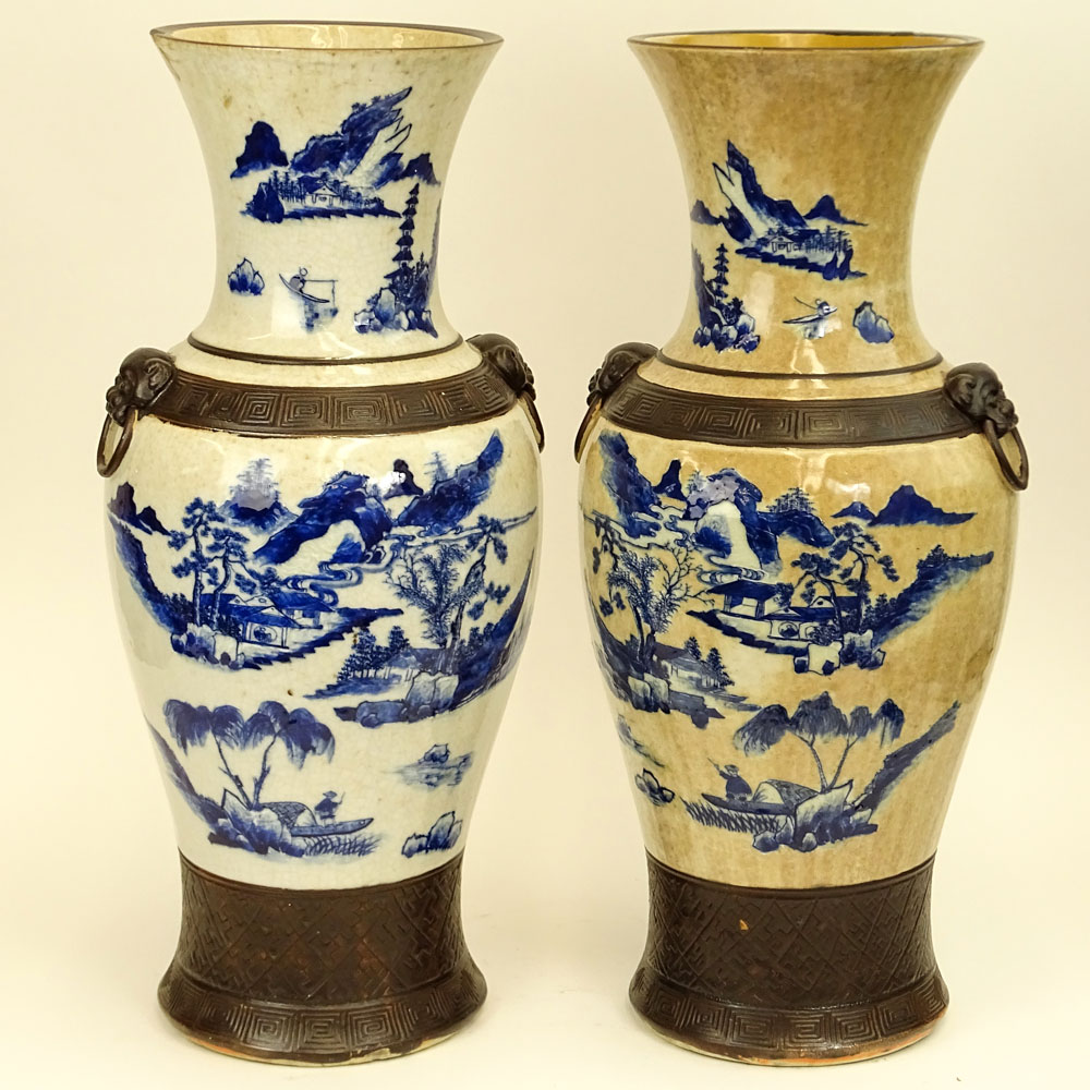 20th Century Chinese Guangxu style pottery vases with raised enamel foot, bands and mock figural ring handles. 